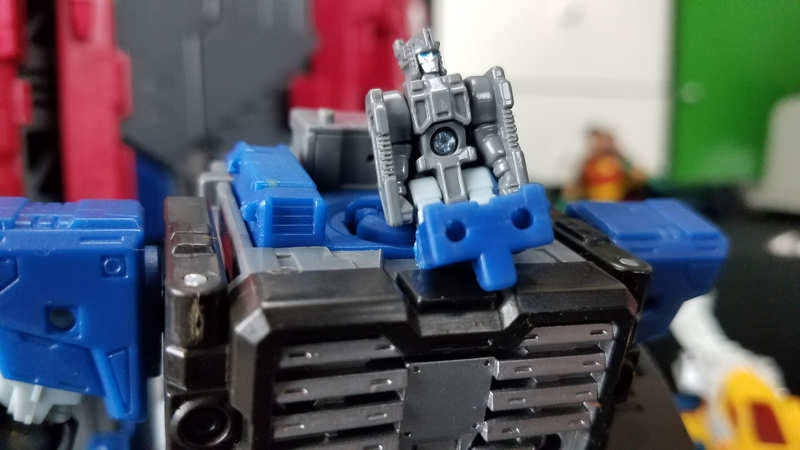 In the Headmasters series, the smaller robots were actually modified humans. This one would have been very upset about its legs.